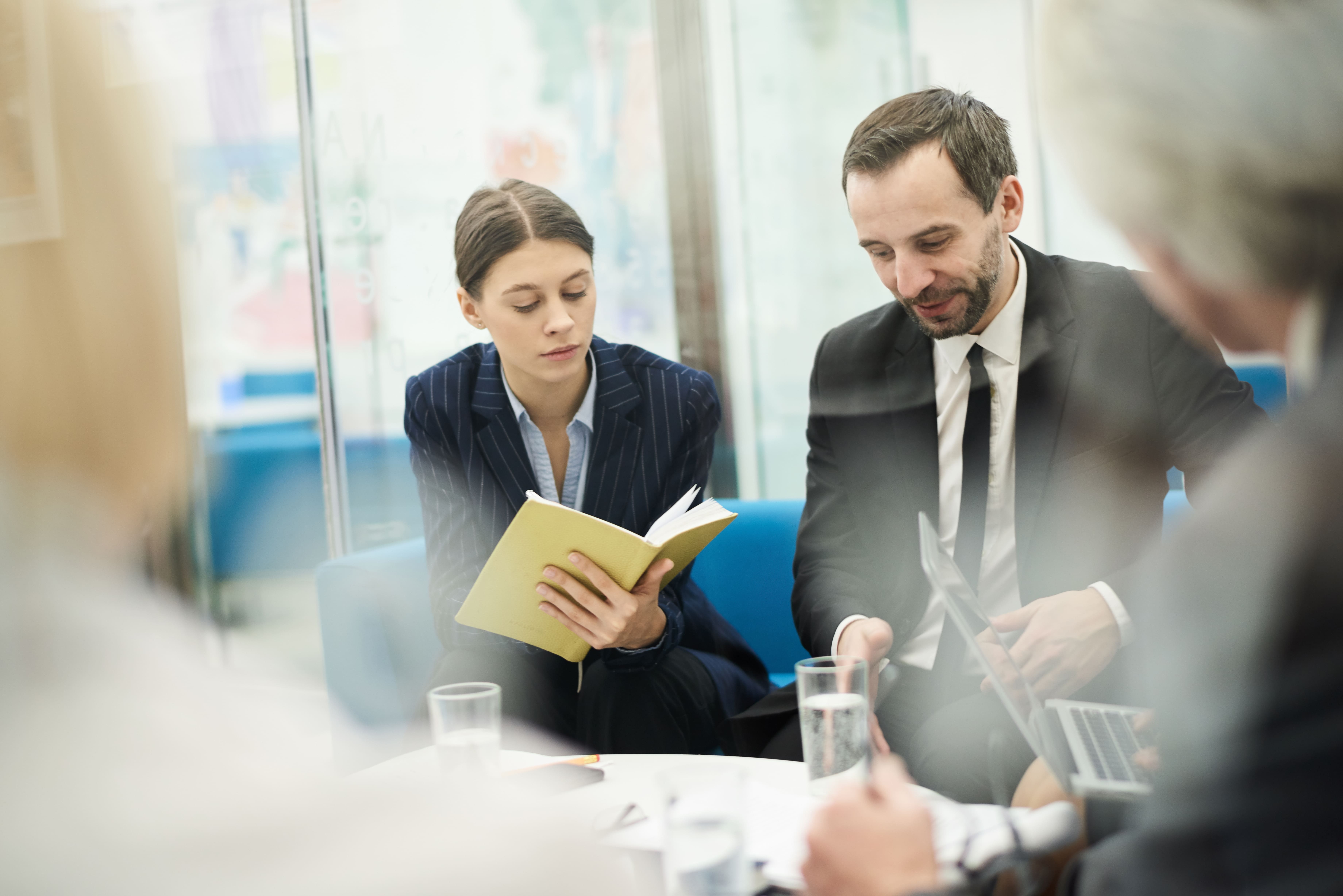 Group of investors meeting to discuss real estate investment strategy